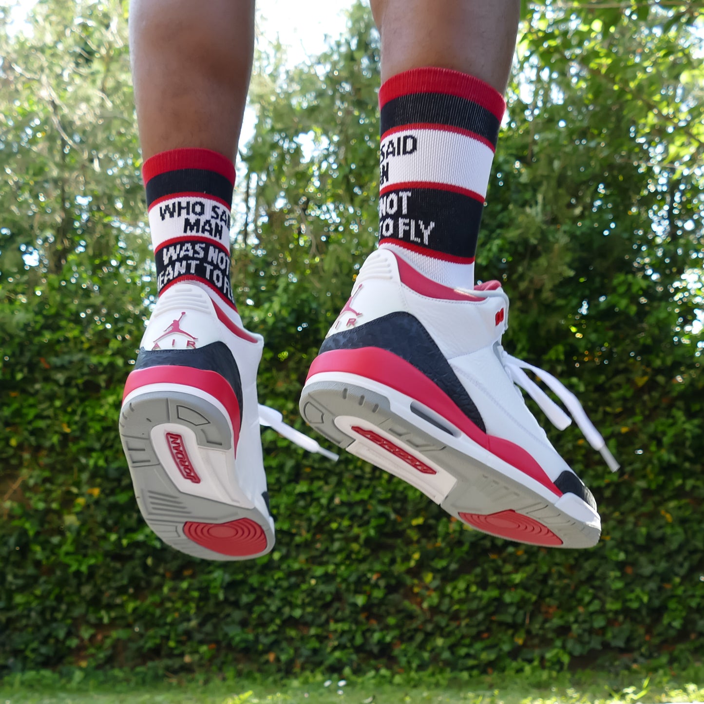 "Who said man was not meant to fly" Socks