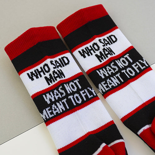 "Who said man was not meant to fly" Socks